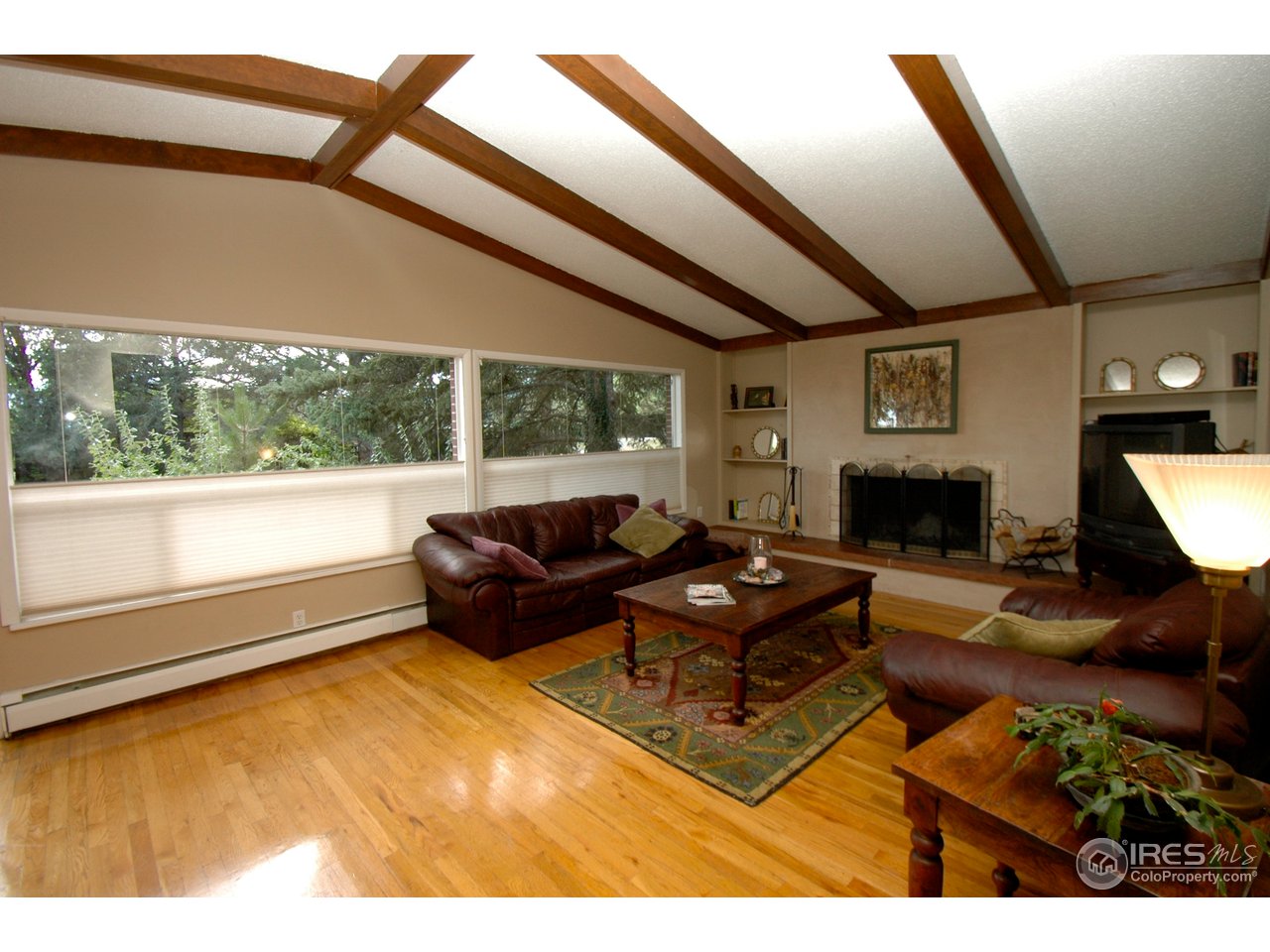 5617 Jay Road Boulder, CO 80301 - Photo 3 of 11 Living Room w/ Vaulted Ceilings & Fireplace