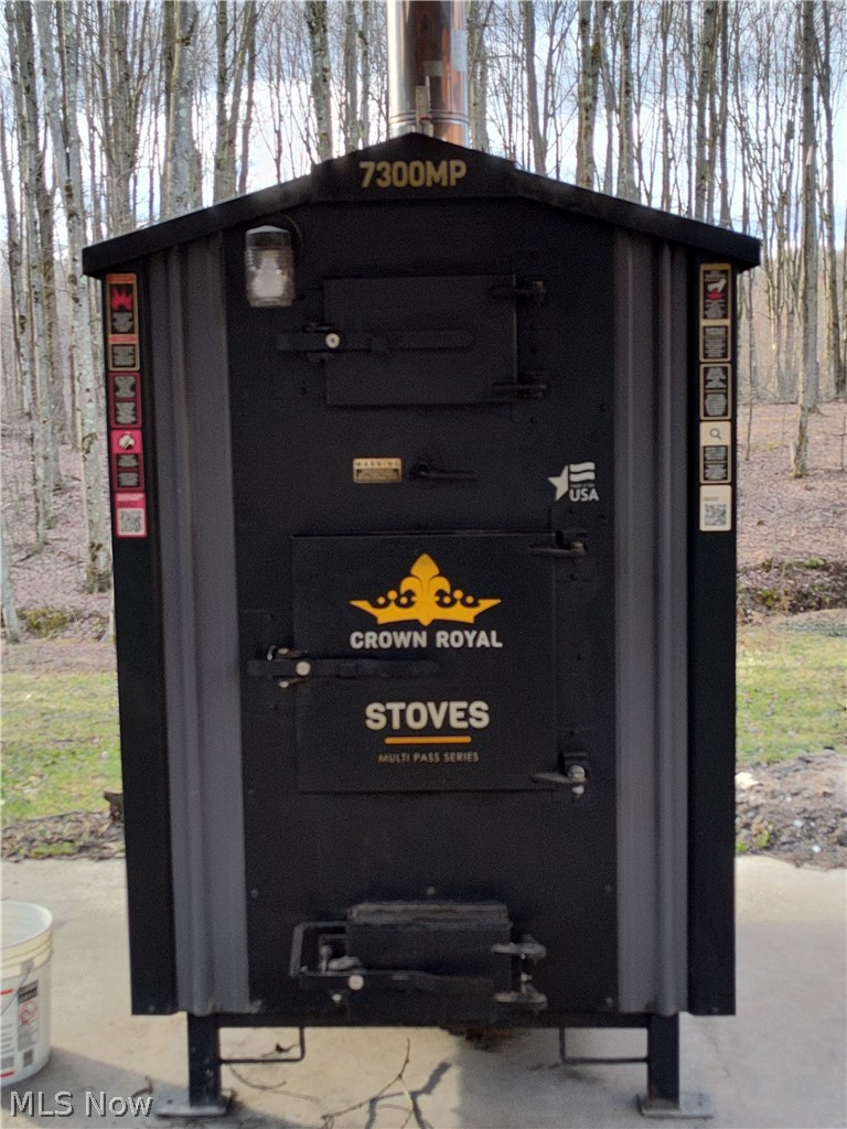 4523 Mechanicsville Road Rome, OH 44085 - Photo 43 of 50 Crown Royal outdoor wood/coal furnace