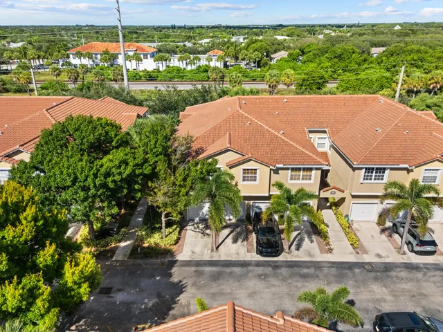 an aerial view of residential building with parking space