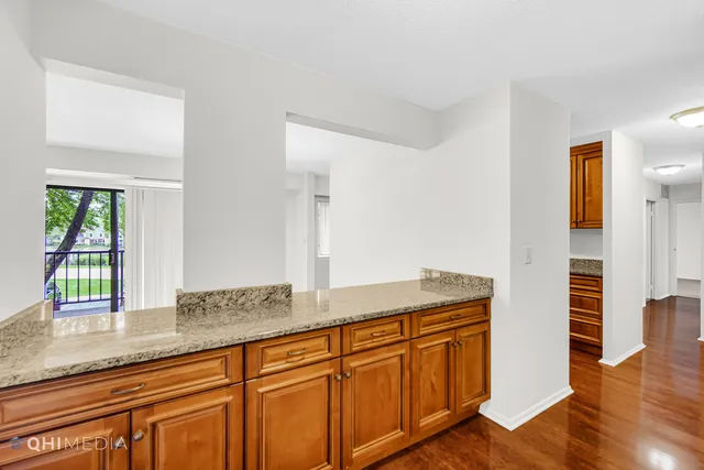 a hallway with sink and window