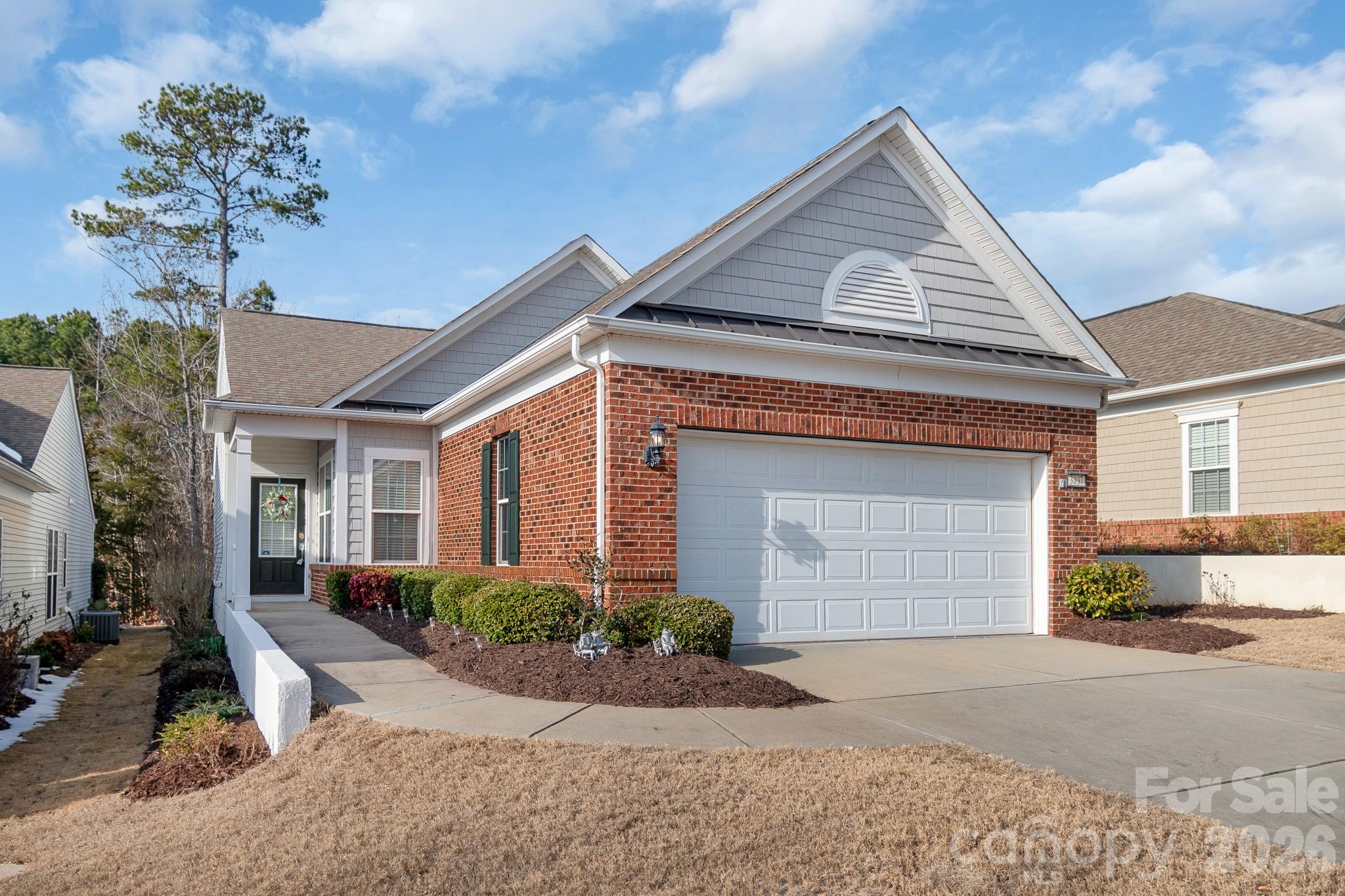 3037 Azalea Drive Fort Mill, SC 29707 - Photo 2 of 24 a front view of a house with a yard