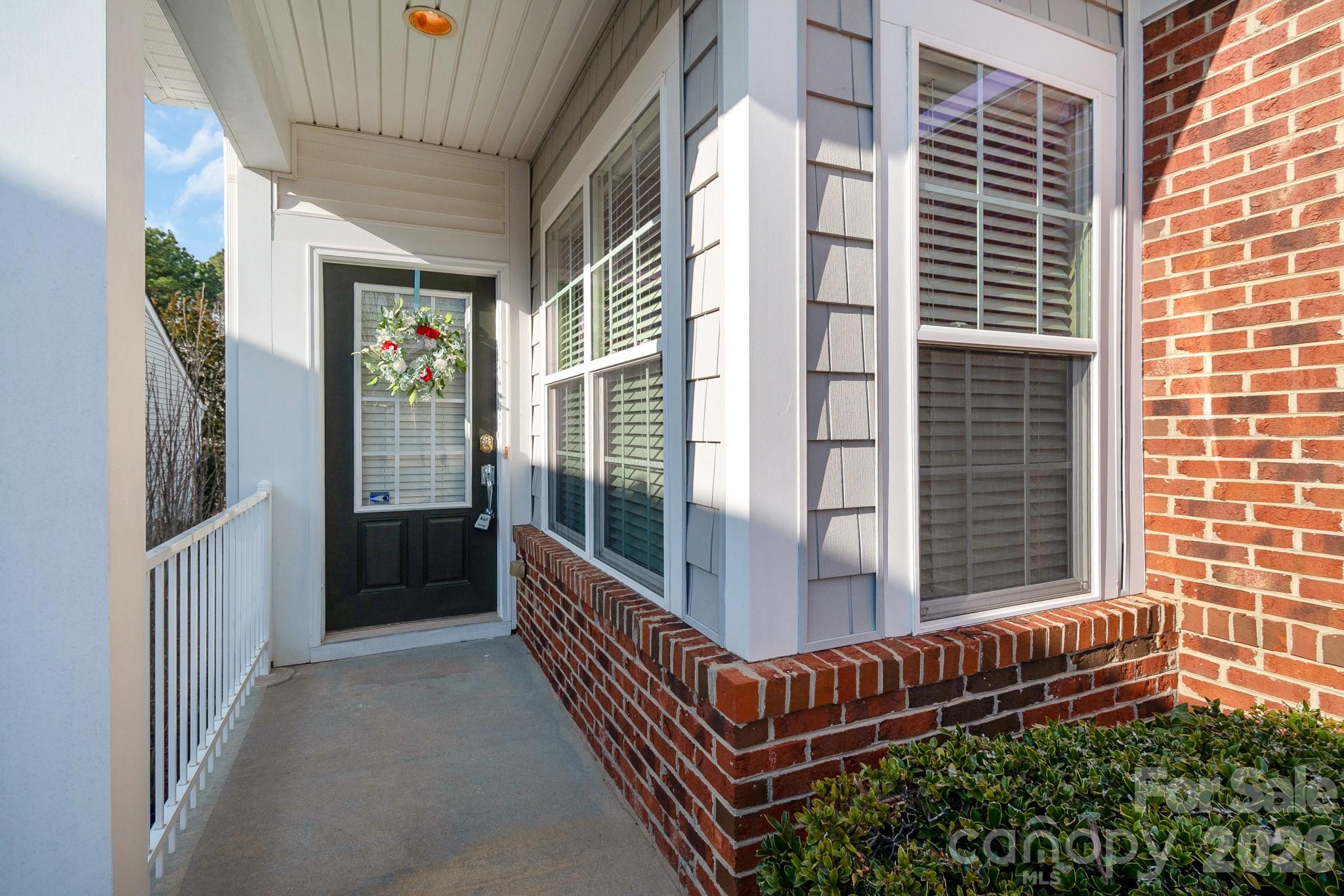 3037 Azalea Drive Fort Mill, SC 29707 - Photo 3 of 24 a view of a porch with furniture and front door