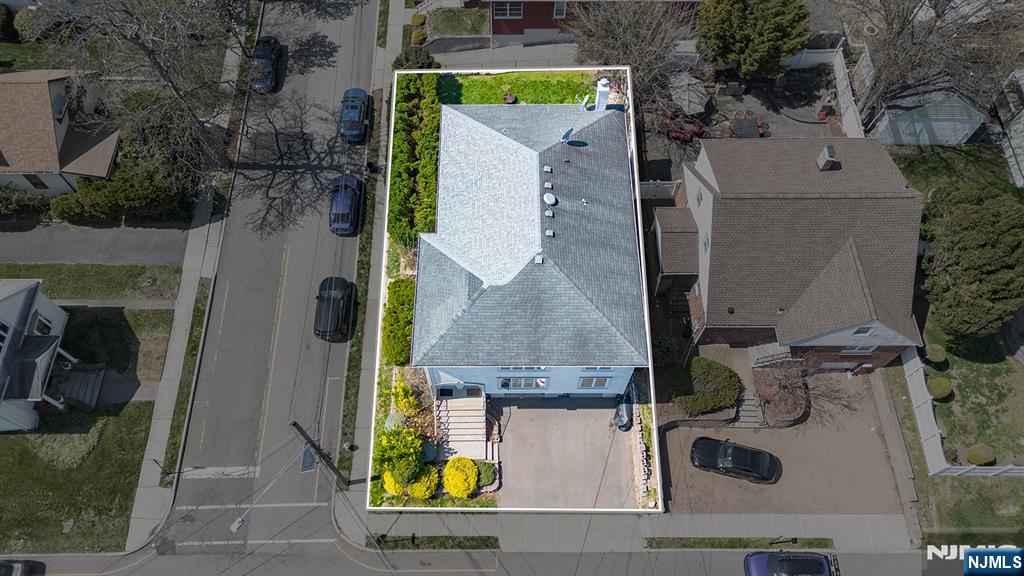 19 Cherry Street Garfield, NJ 07026 - Photo 3 of 43 an aerial view of residential houses with outdoor space