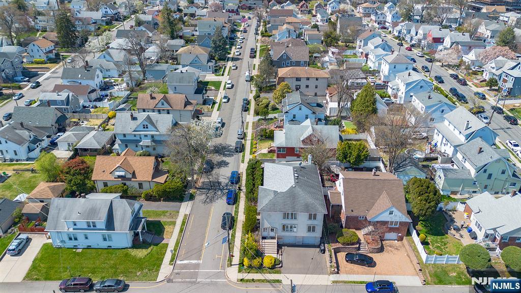 19 Cherry Street Garfield, NJ 07026 - Photo 40 of 43 an aerial view of residential houses with outdoor space