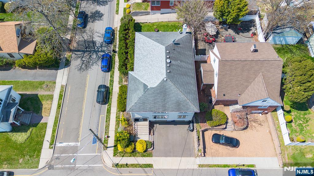 19 Cherry Street Garfield, NJ 07026 - Photo 4 of 43 an aerial view of residential houses with outdoor space
