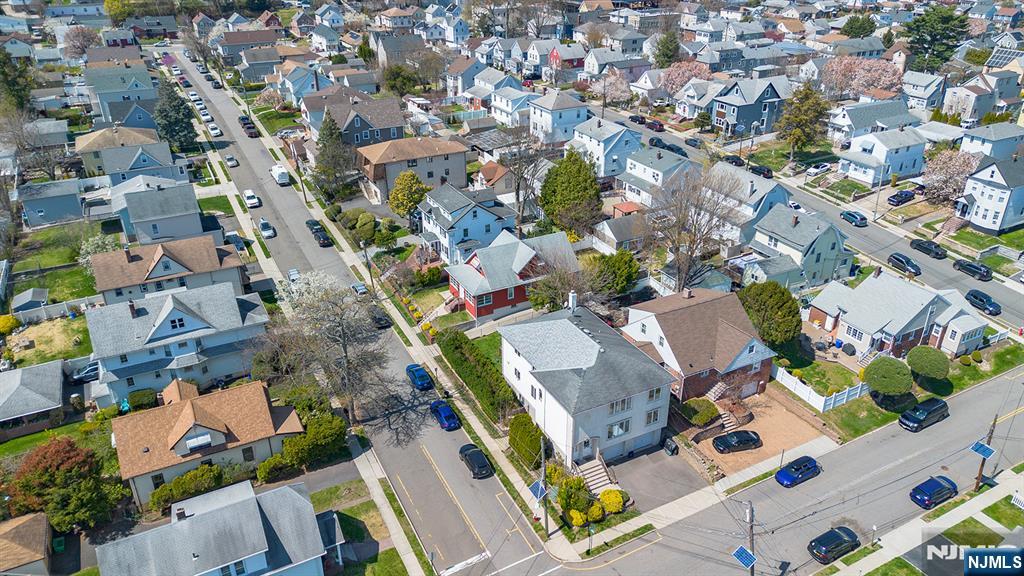 19 Cherry Street Garfield, NJ 07026 - Photo 41 of 43 an aerial view of residential houses with outdoor space