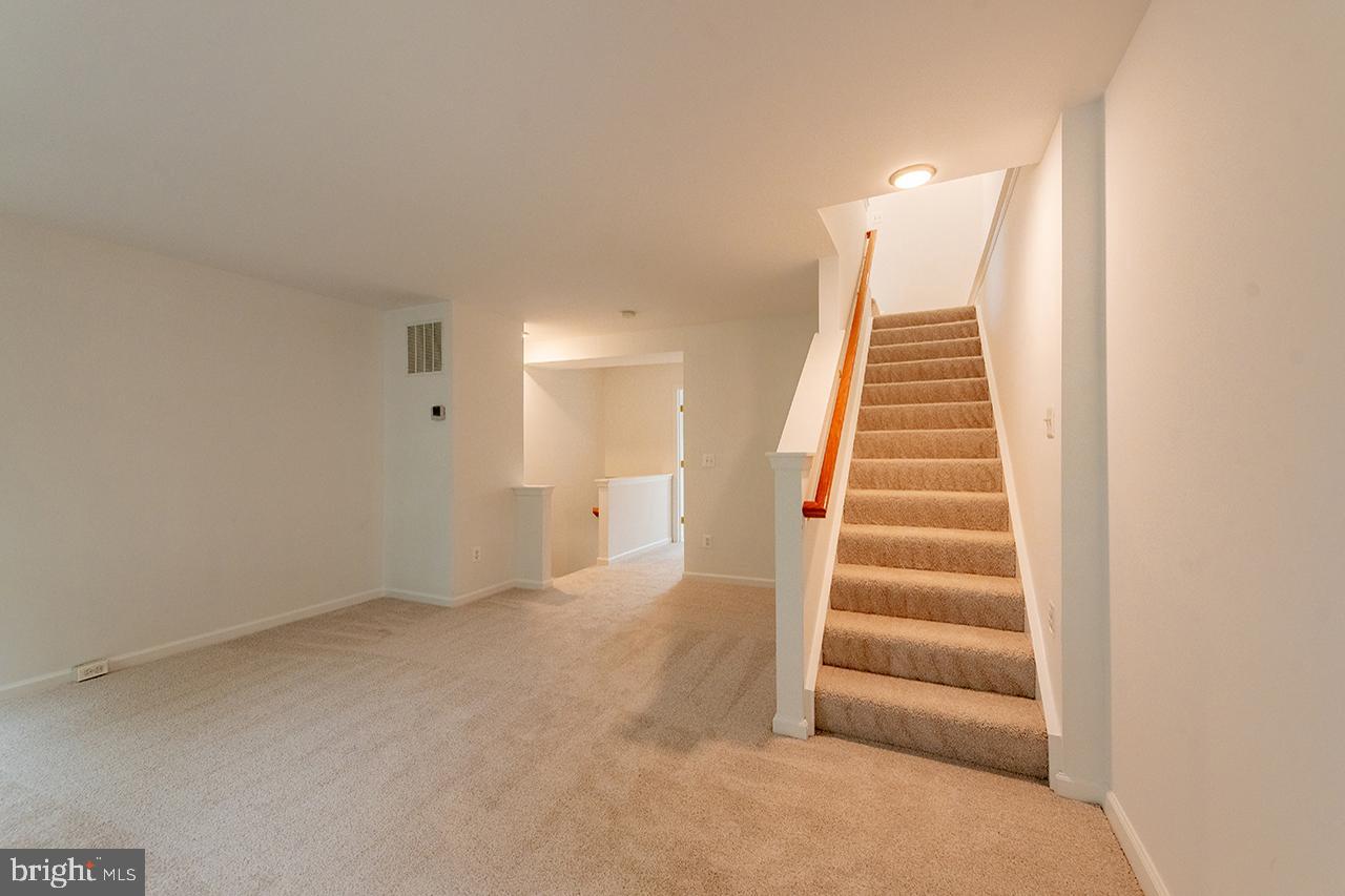 21081 Bitterroot Terrace Ashburn, VA 20147 - Photo 13 of 25 Second level family room.