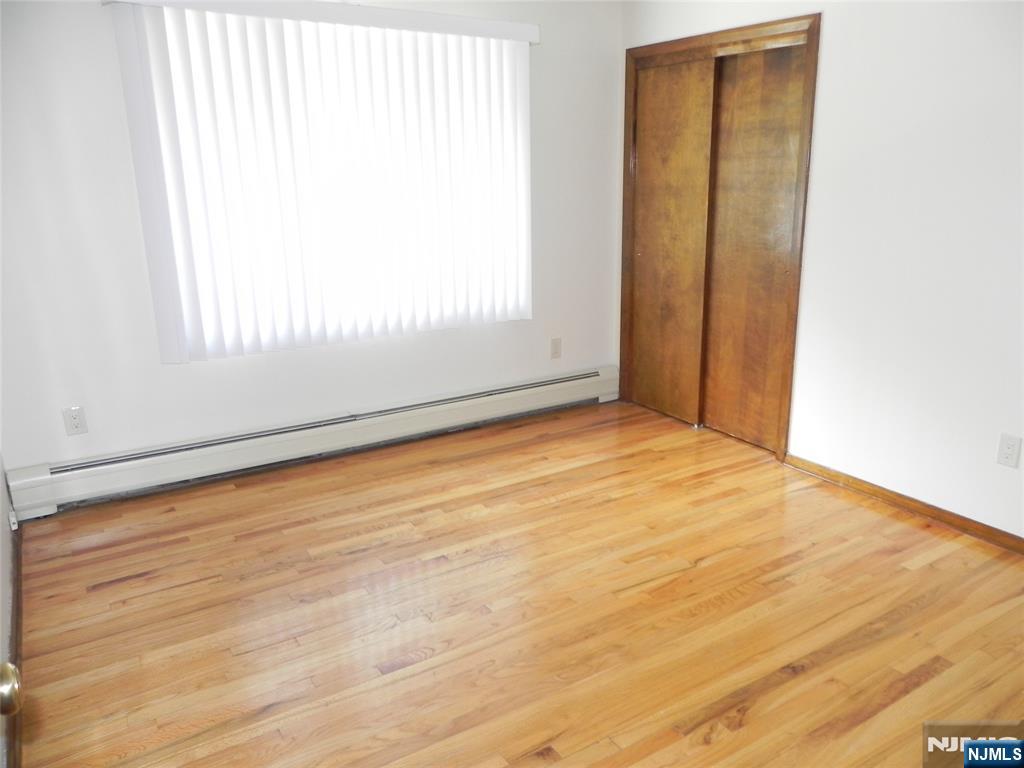 52 Wilson Street, Unit 2 Little Ferry, NJ 07643 - Photo 10 of 11 an empty room with window