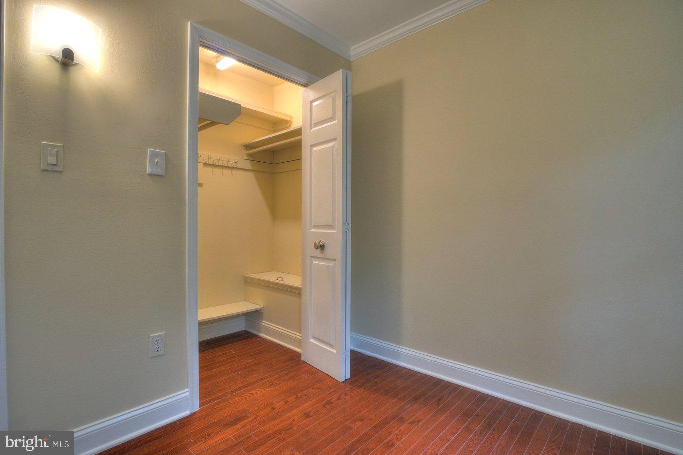 2405 Earlsgate Court Reston, VA 20191 - Photo 33 of 56 Spacious closet with warm tones.