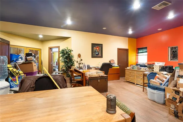 a view of a living room and dining room