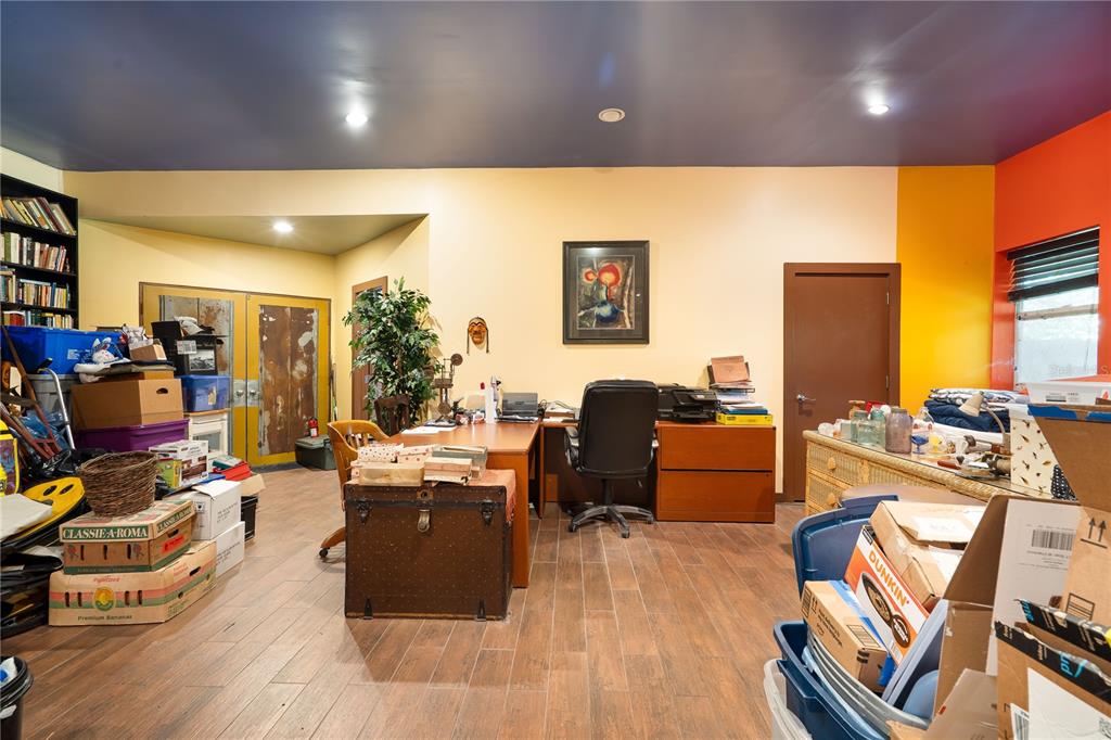 6924 Valrie Lane Riverview, FL 33569 - Photo 14 of 29 a room with furniture and a flat screen tv