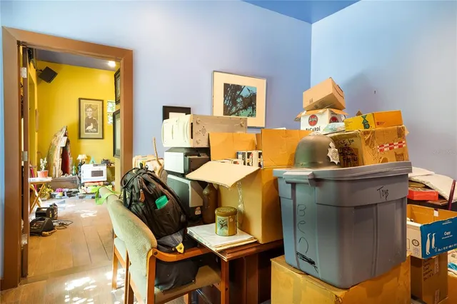 a living room with furniture and a table