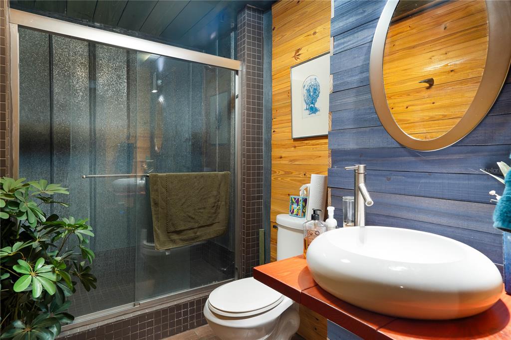 6924 Valrie Lane Riverview, FL 33569 - Photo 18 of 29 a bathroom with a sink a toilet and shower