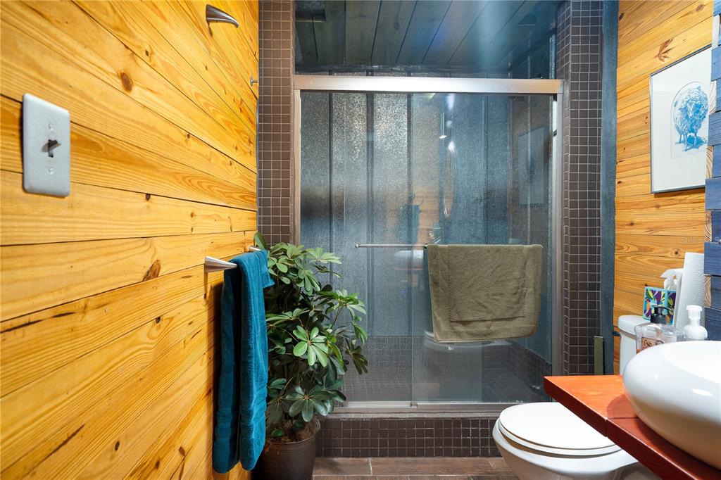 6924 Valrie Lane Riverview, FL 33569 - Photo 19 of 29 a bathroom with a toilet and a shower