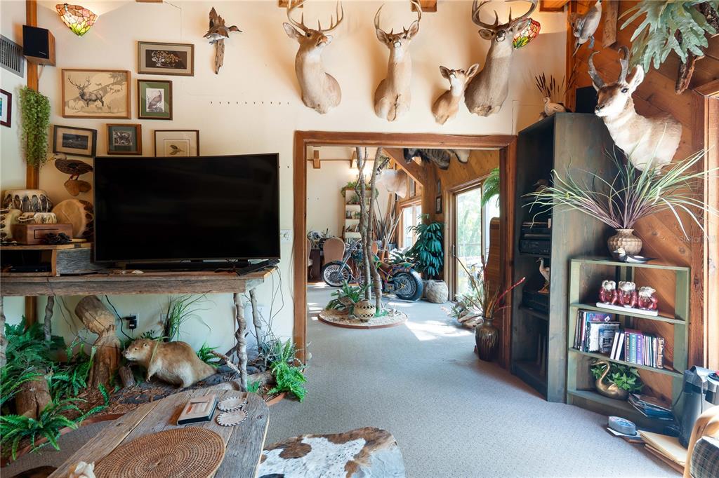 6924 Valrie Lane Riverview, FL 33569 - Photo 20 of 29 a living room with patio furniture and a flat screen tv