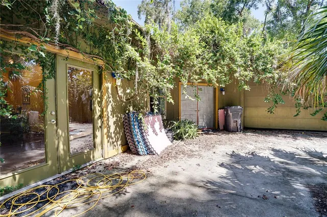 a view of a house with a tree