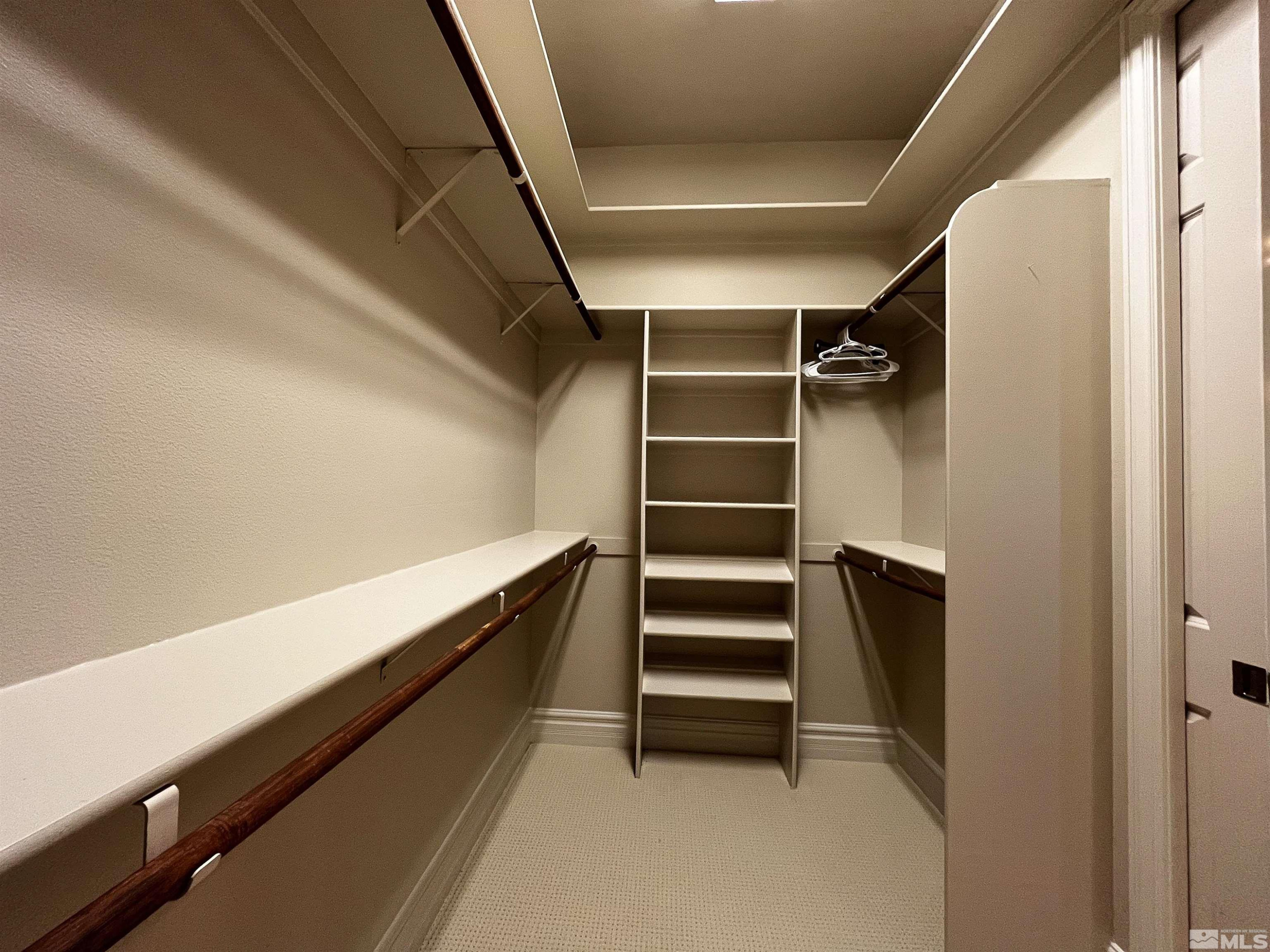 4875 Mountainshyre Road Reno, NV 89519 - Photo 8 of 13 a view of walk in closet with empty racks