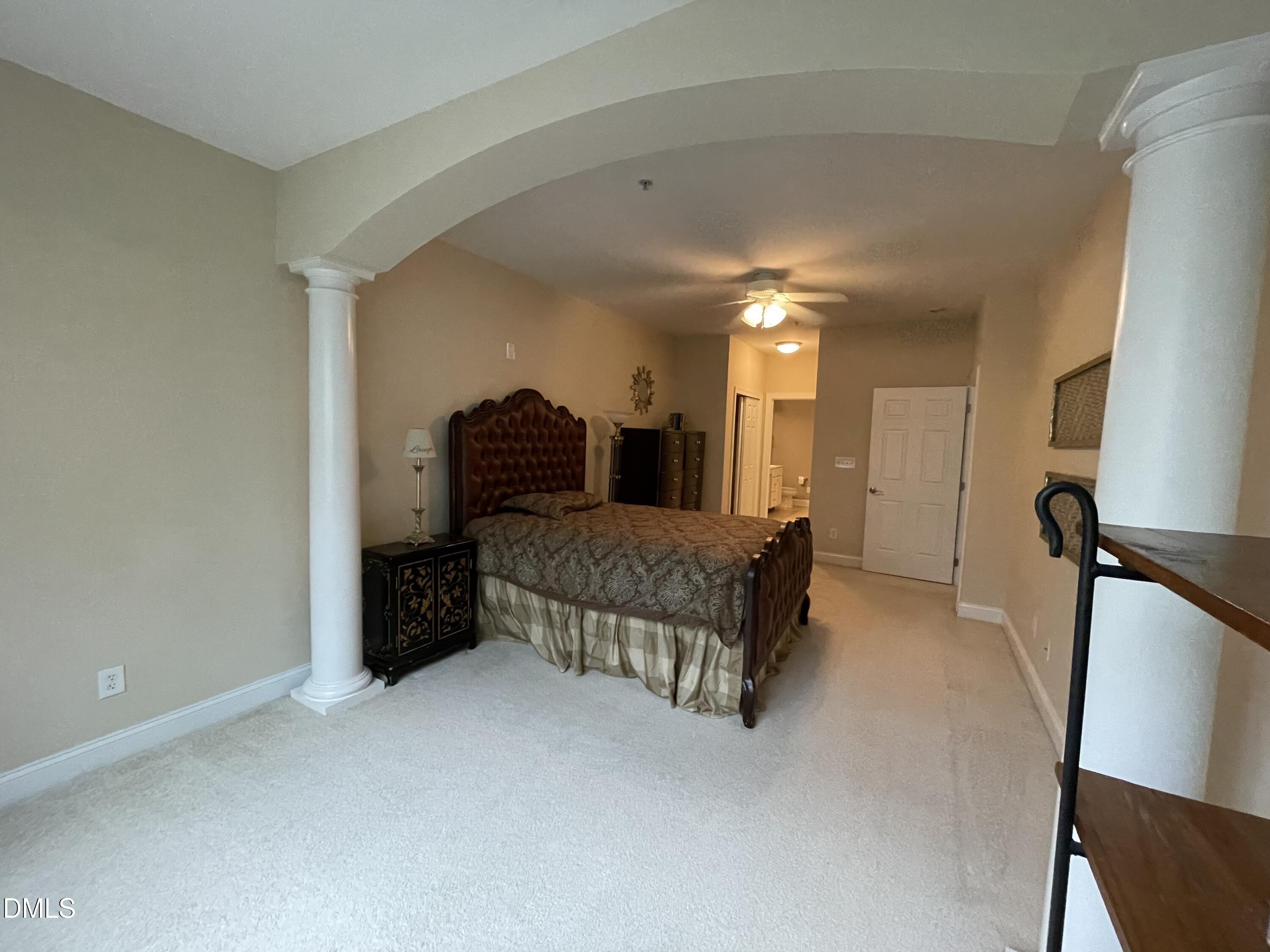 10411 Rosegate Court, Unit 3 Raleigh, NC 27617 - Photo 26 of 62 a living room with furniture and a lamp