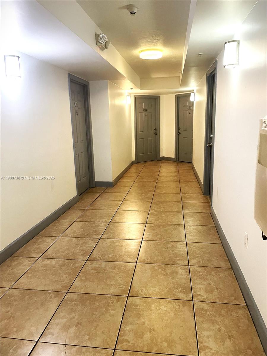 102 Southwest 6th Avenue, Unit 501 Miami, FL 33130 - Photo 17 of 18 a view of a hallway