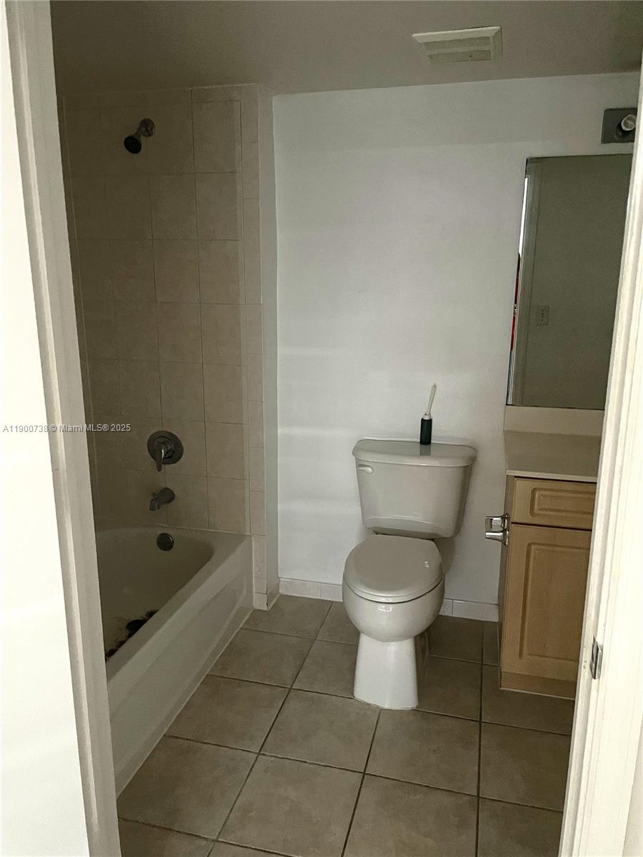 102 Southwest 6th Avenue, Unit 501 Miami, FL 33130 - Photo 4 of 18 a bathroom with a toilet and a shower