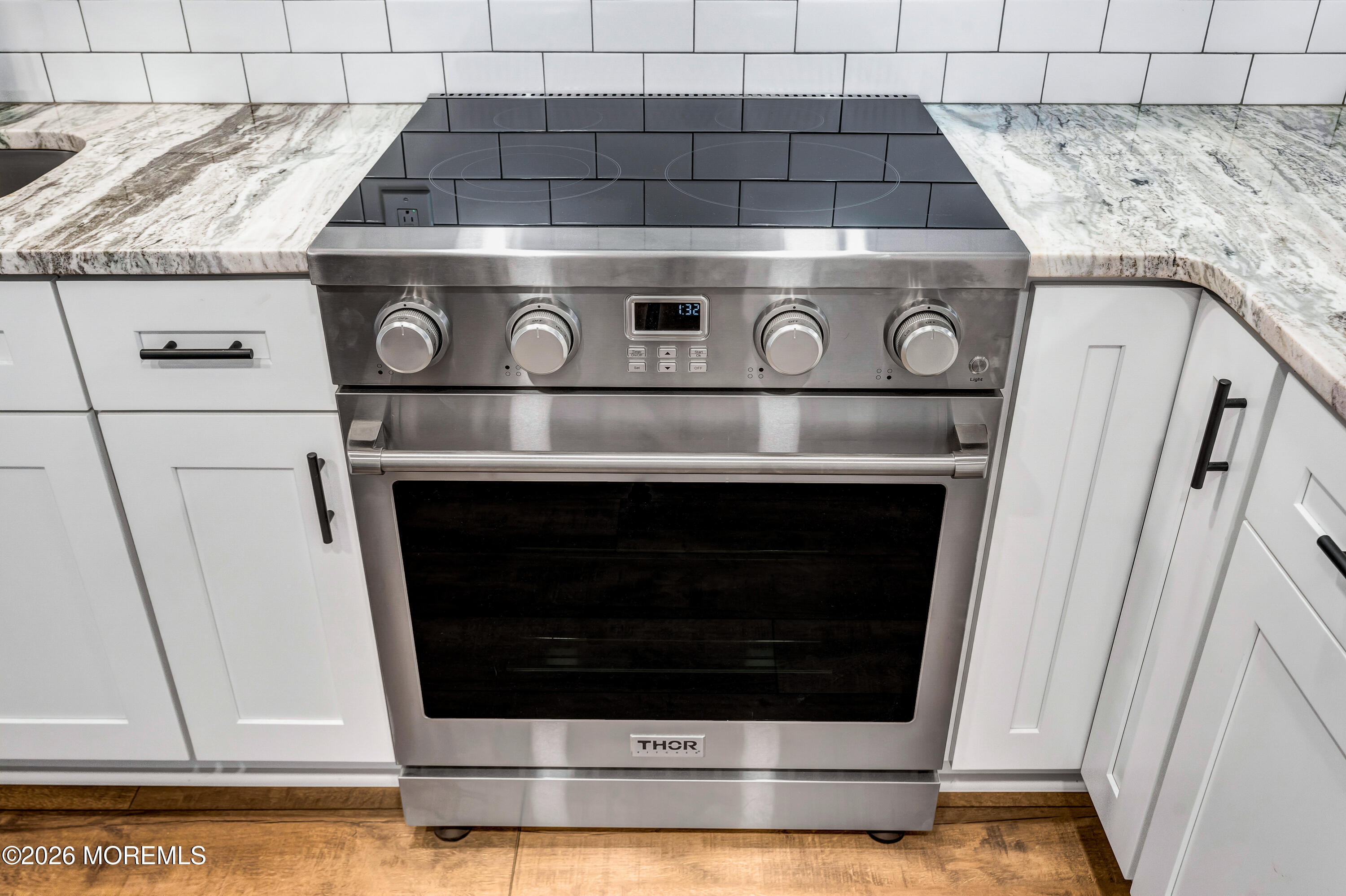 32 Chestnut Street Waretown, NJ 08758 - Photo 13 of 35 a stove top oven sitting inside of a kitchen