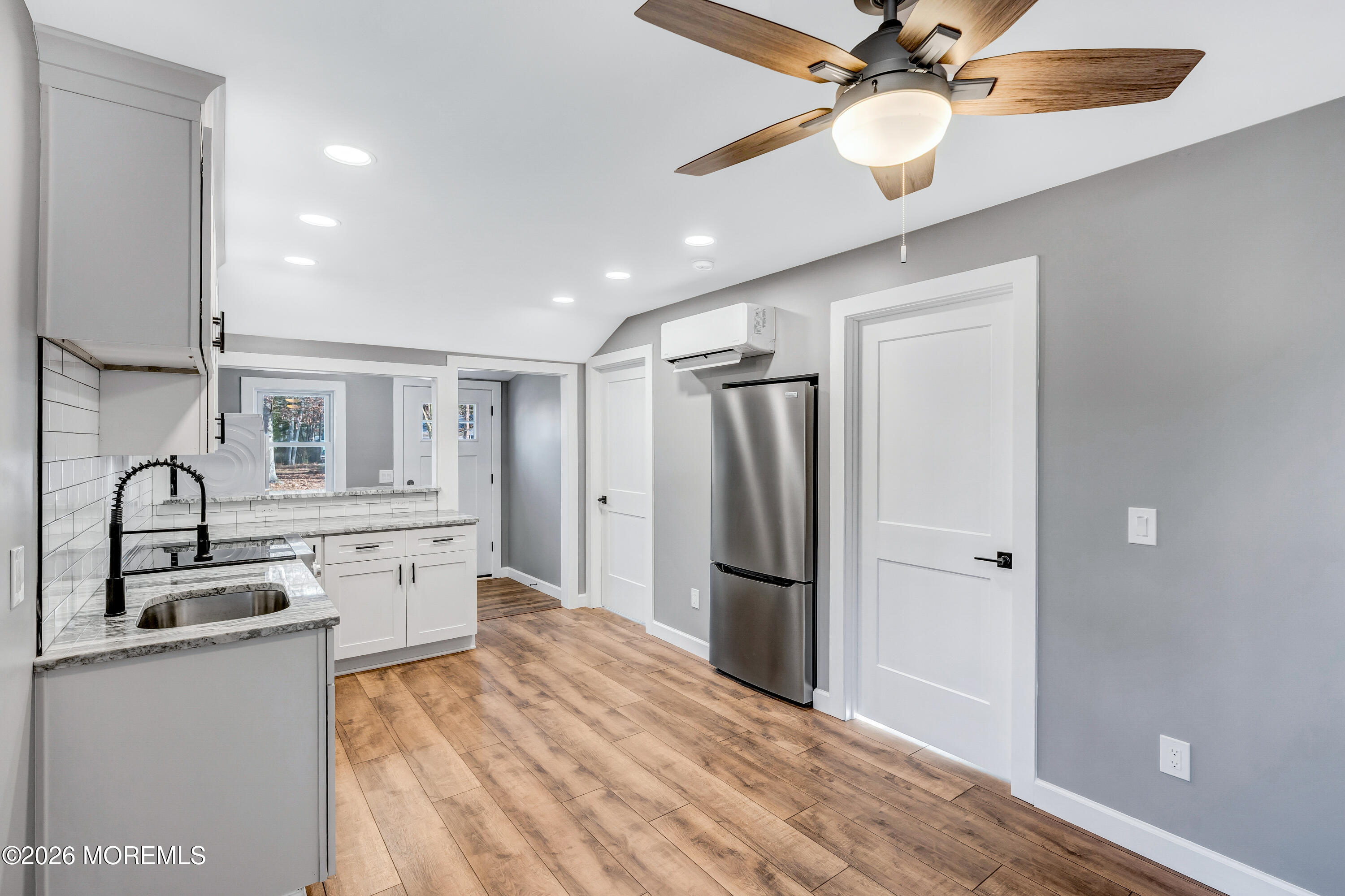 32 Chestnut Street Waretown, NJ 08758 - Photo 15 of 35 a kitchen with stainless steel appliances granite countertop a refrigerator a sink and dishwasher