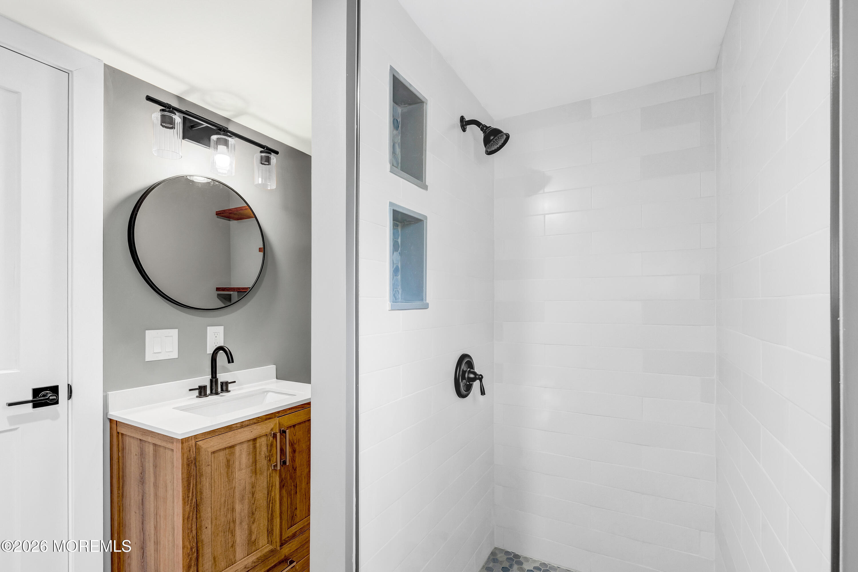32 Chestnut Street Waretown, NJ 08758 - Photo 18 of 35 a bathroom with a sink and a mirror