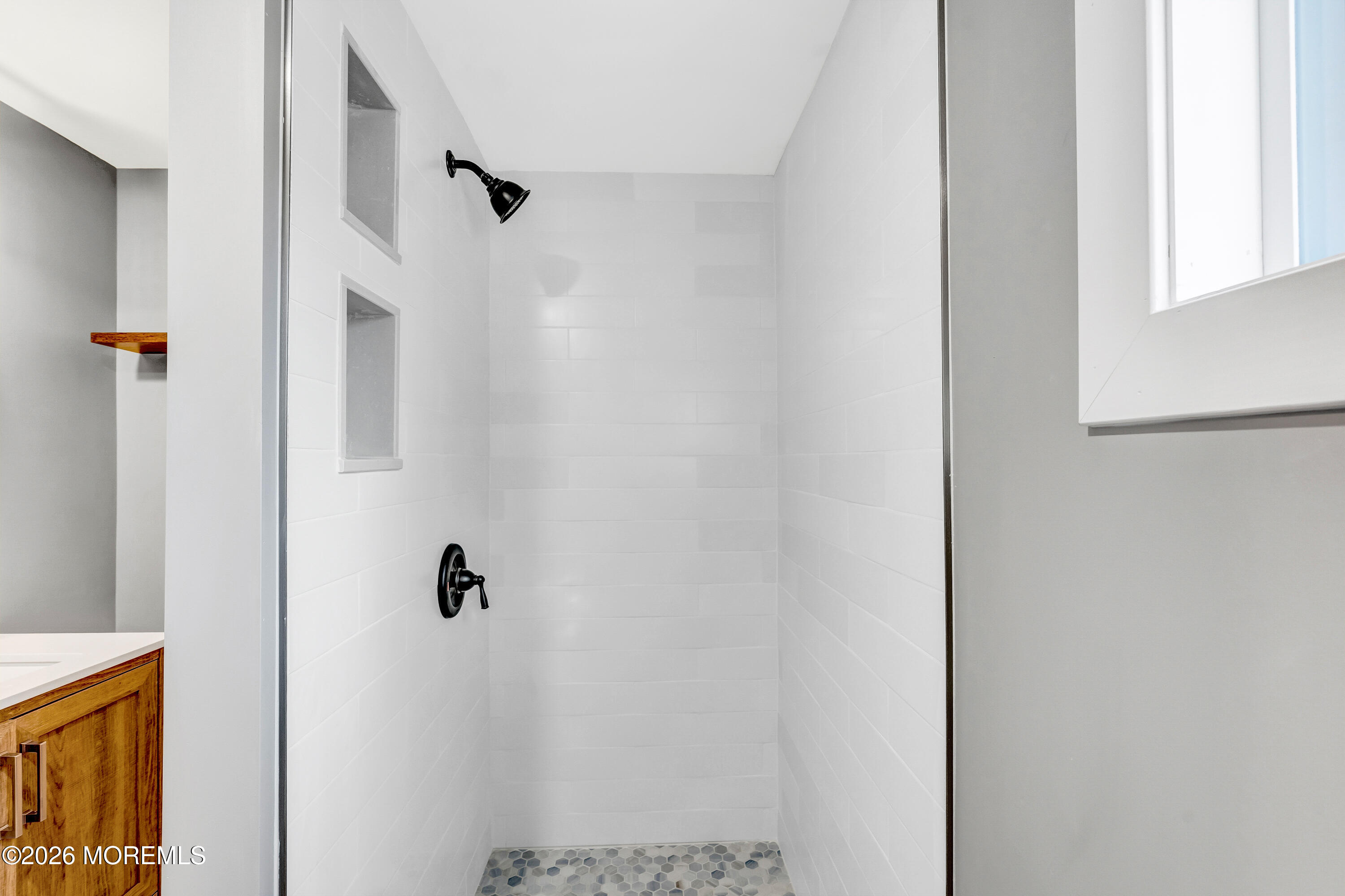 32 Chestnut Street Waretown, NJ 08758 - Photo 19 of 35 a bathroom with a shower