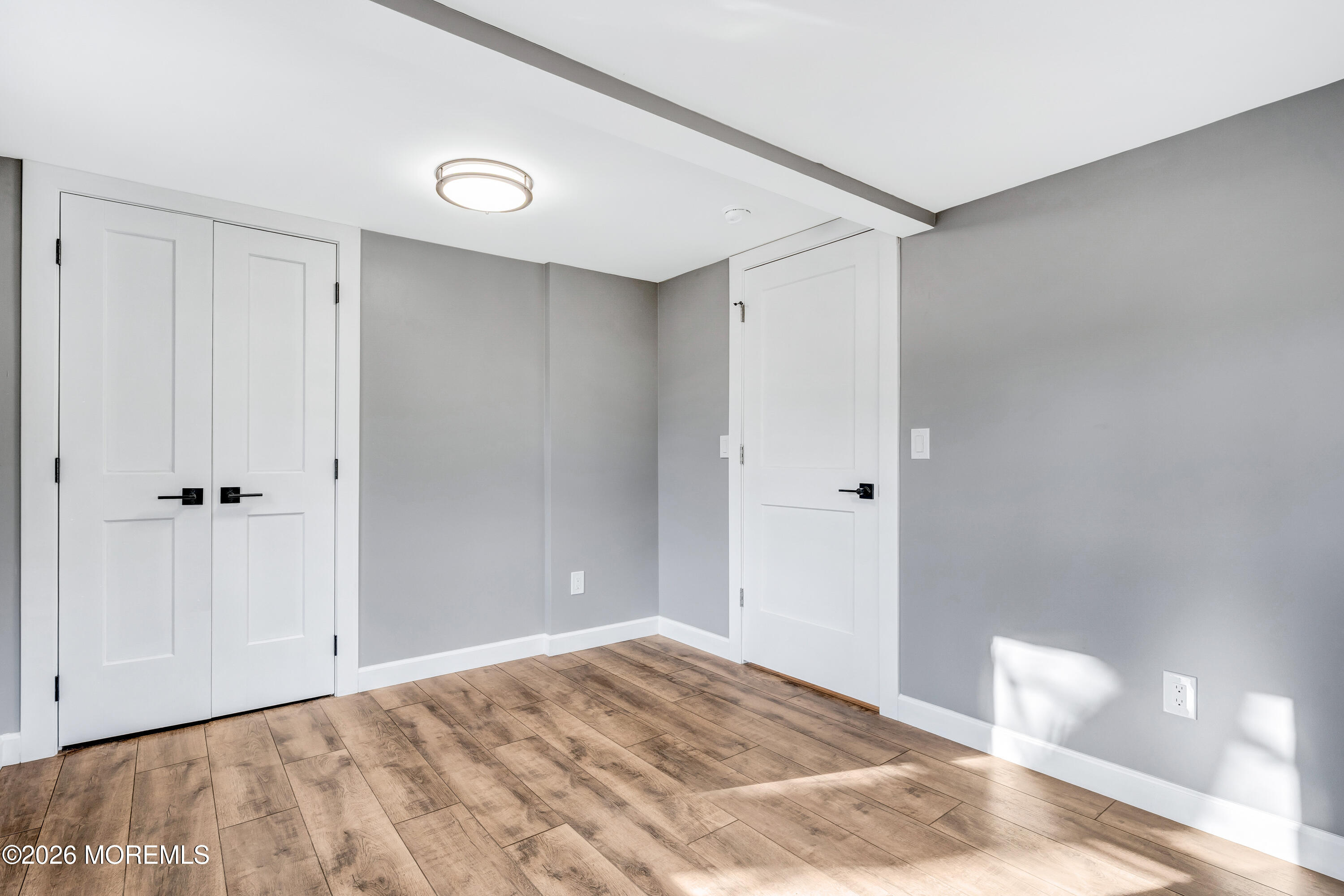 32 Chestnut Street Waretown, NJ 08758 - Photo 27 of 35 a view of a room with a furniture and wooden floor