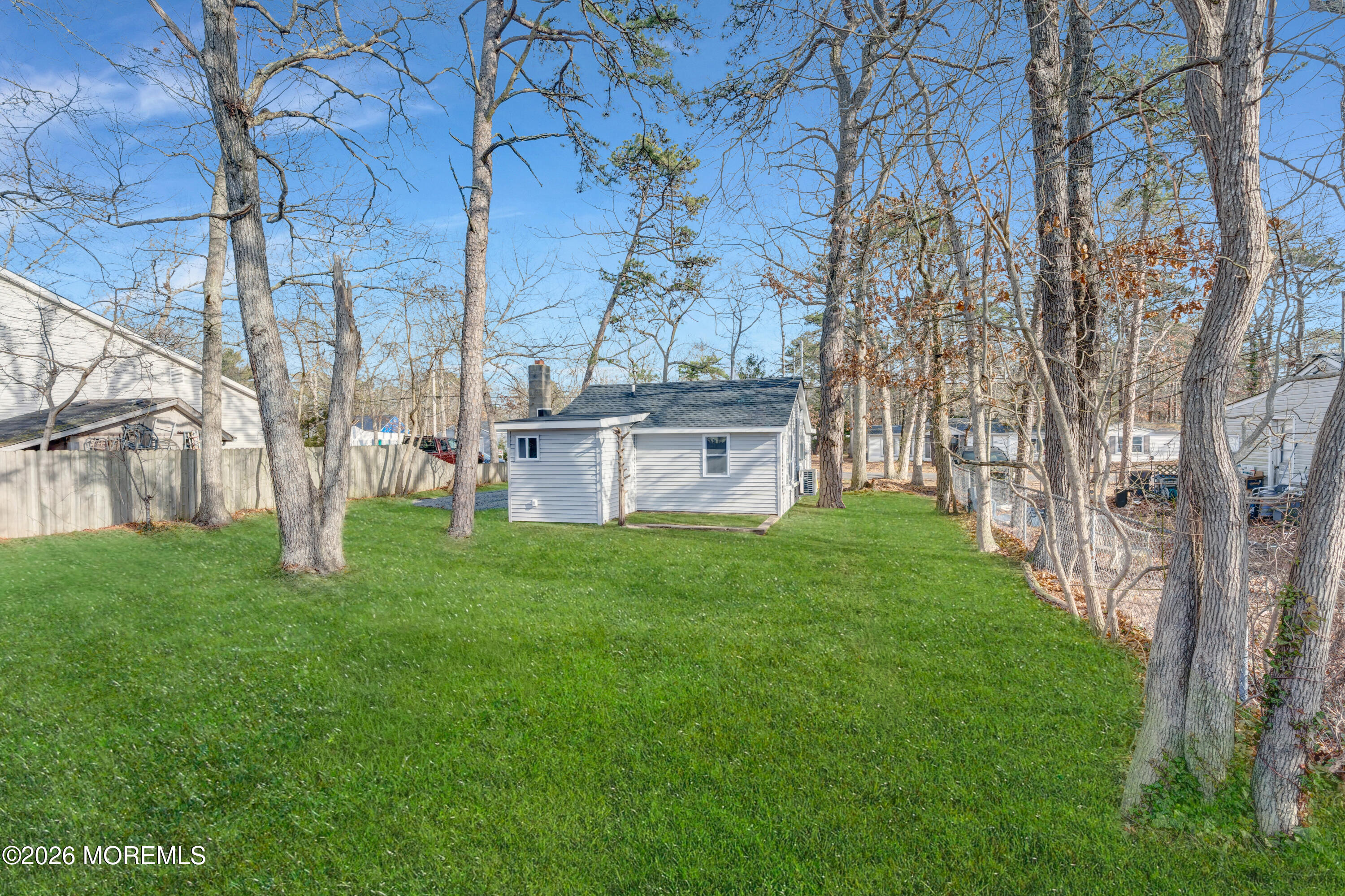 32 Chestnut Street Waretown, NJ 08758 - Photo 31 of 35 a view of a house with a yard