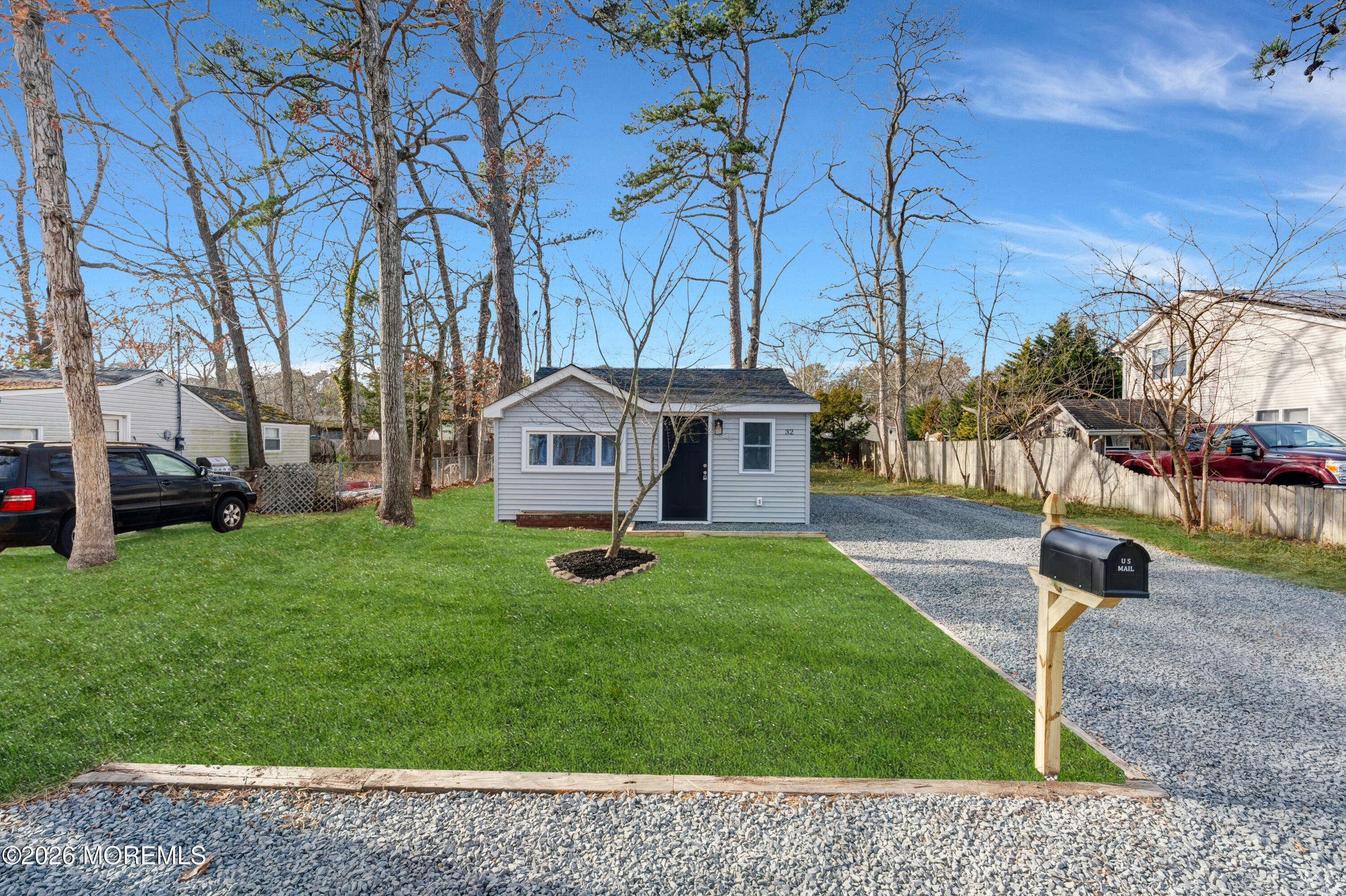 32 Chestnut Street Waretown, NJ 08758 - Photo 34 of 35 a front view of a house with garden