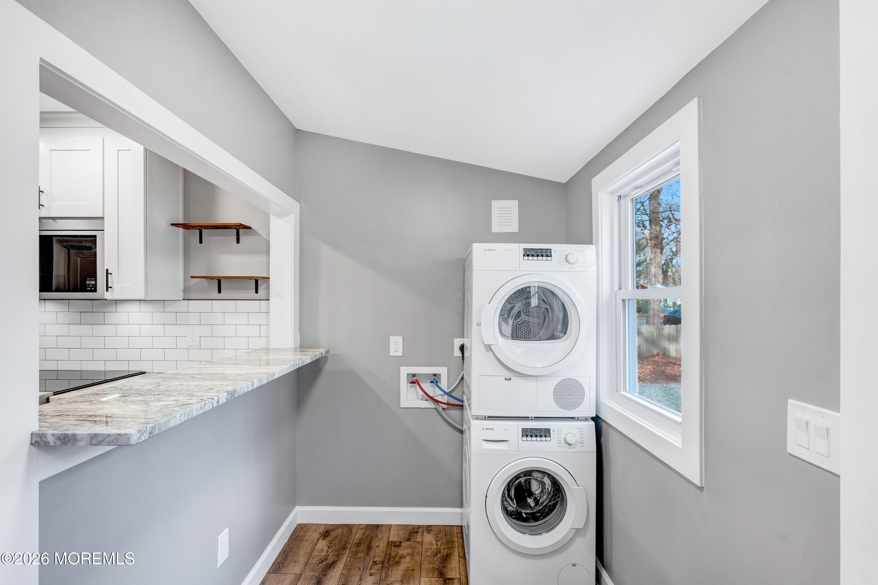 32 Chestnut Street Waretown, NJ 08758 - Photo 6 of 35 a utility room with sink dryer and washer