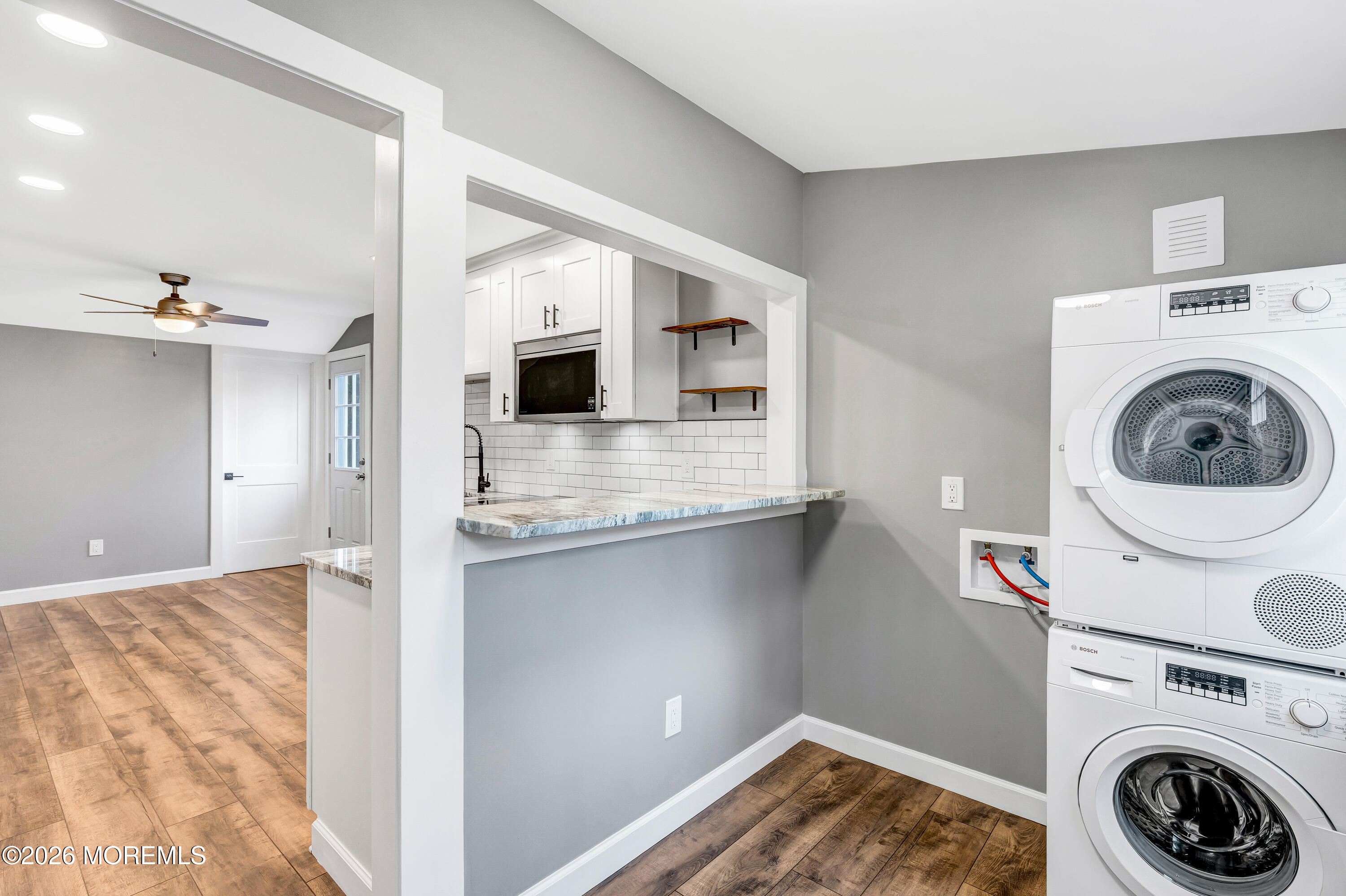 32 Chestnut Street Waretown, NJ 08758 - Photo 7 of 35 a view of kitchen and utility room