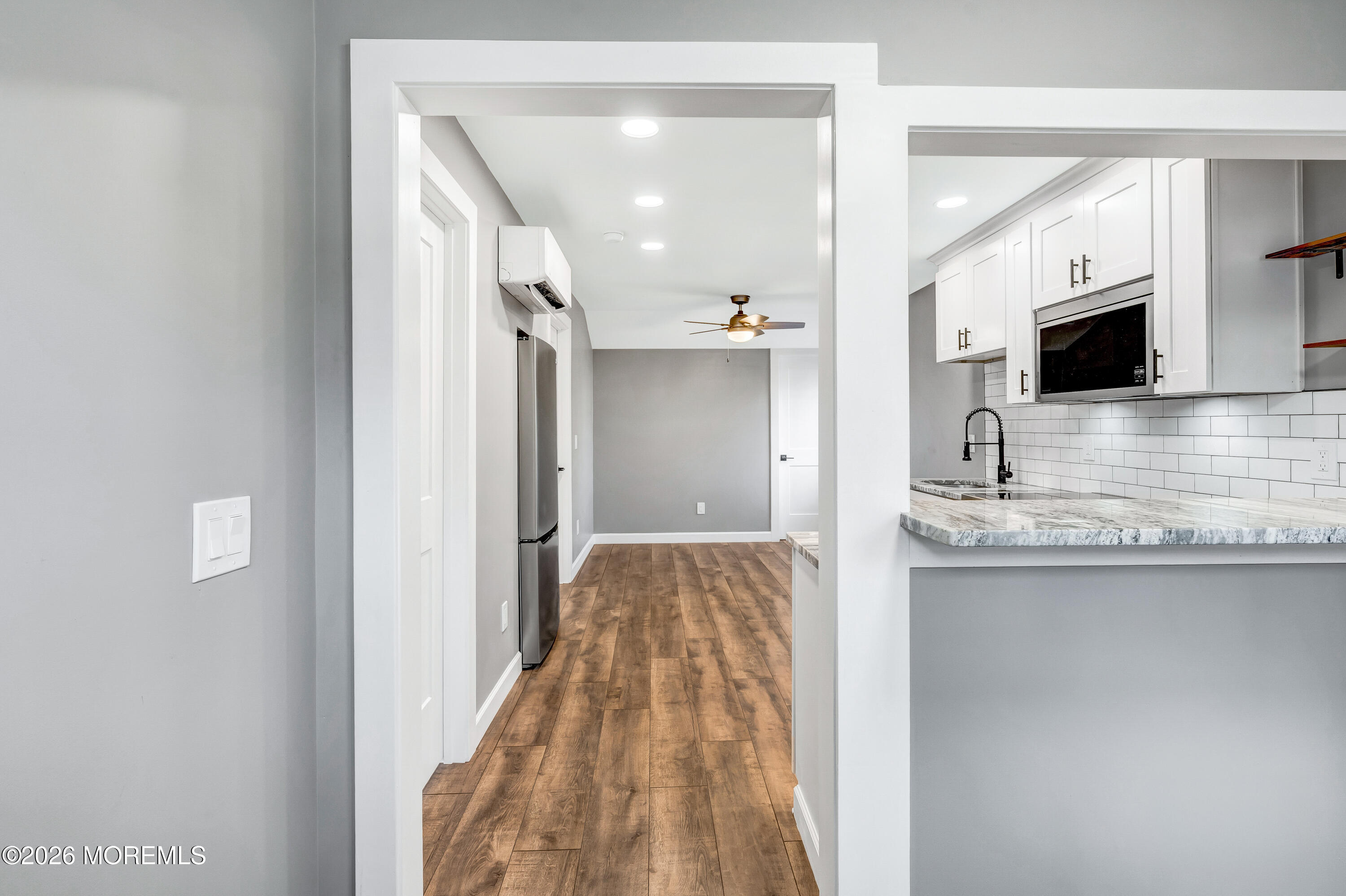 32 Chestnut Street Waretown, NJ 08758 - Photo 8 of 35 a view of living room with granite countertop furniture and fireplace