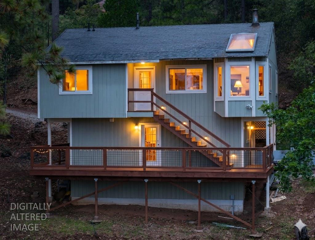 4850 8 Mile Road Camino, CA 95709 - Photo 5 of 34 a house view with a swimming pool and wooden bench