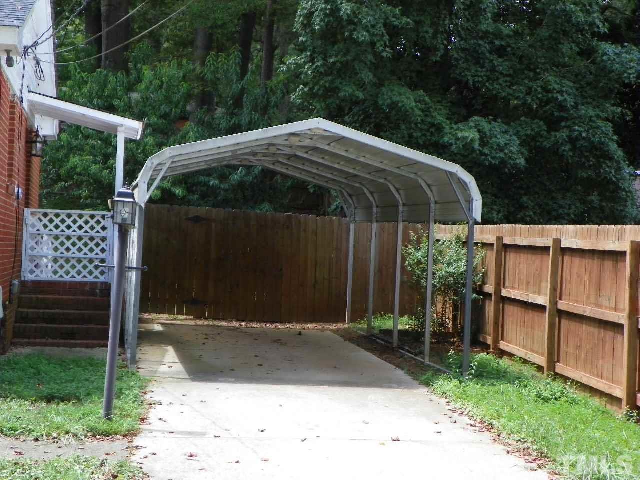 3105 Crandon Lane Raleigh, NC 27604 - Photo 3 of 14 a backyard of a house with lots of green space
