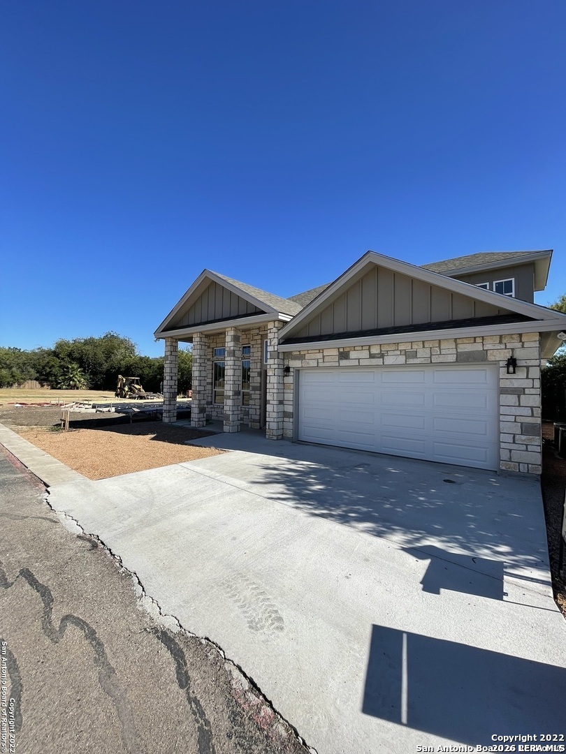 107 Sutton Place Uvalde, TX 78801 - Photo 1 of 11 a view of a house with a yard