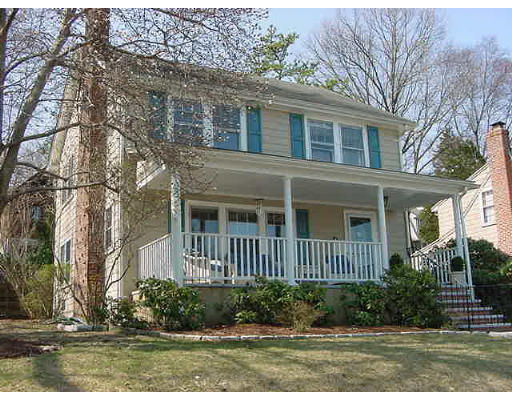 2 Florence Road Waltham, MA 02453 - Photo 1 of 13 a front view of a house with a yard