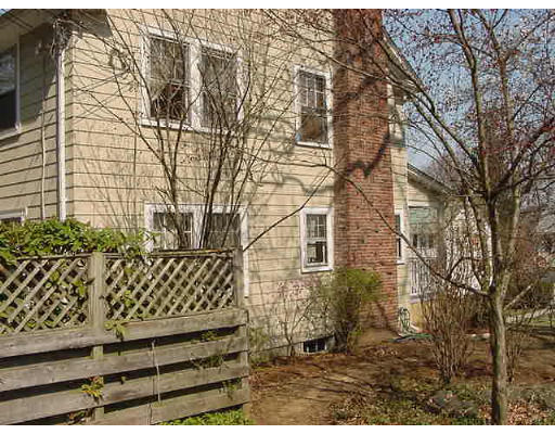 2 Florence Road Waltham, MA 02453 - Photo 13 of 13 a view of a wooden house with a yard