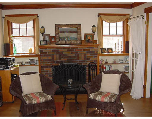 2 Florence Road Waltham, MA 02453 - Photo 8 of 13 a living room with furniture and a fireplace