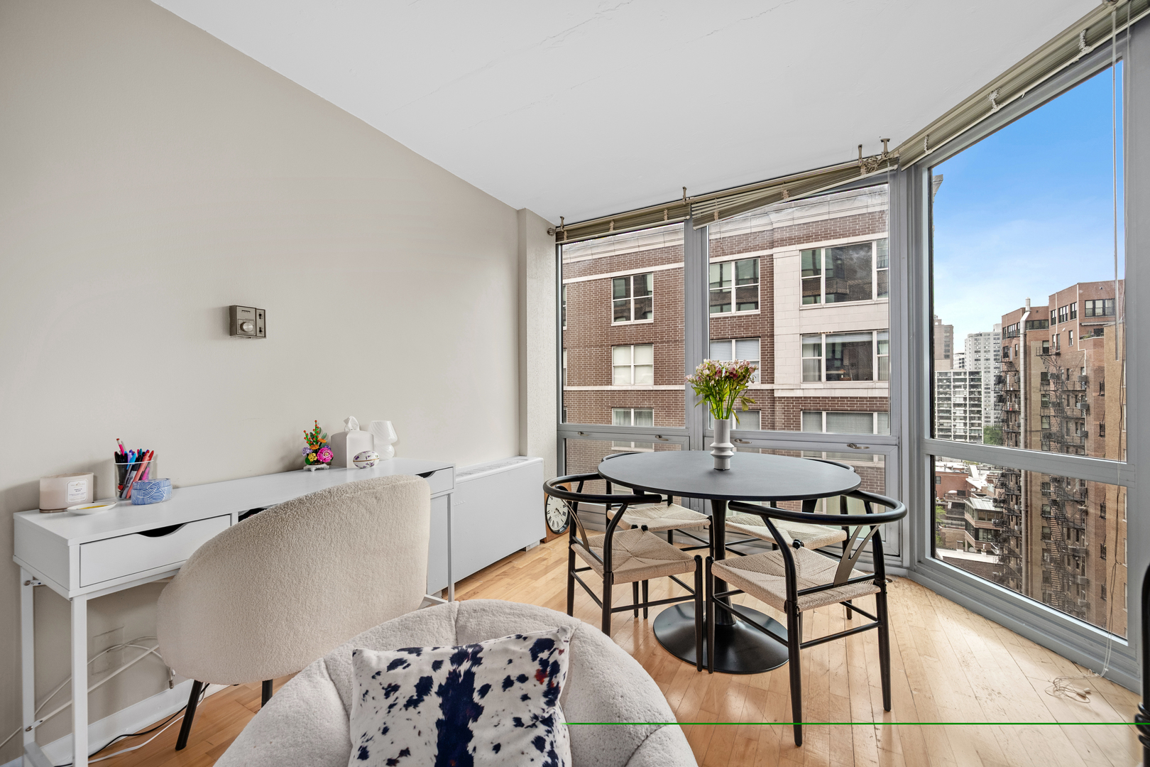 21 West Goethe Street, Unit 16E Chicago, IL 60610 - Photo 4 of 14 a view of a workspace with furniture and toys