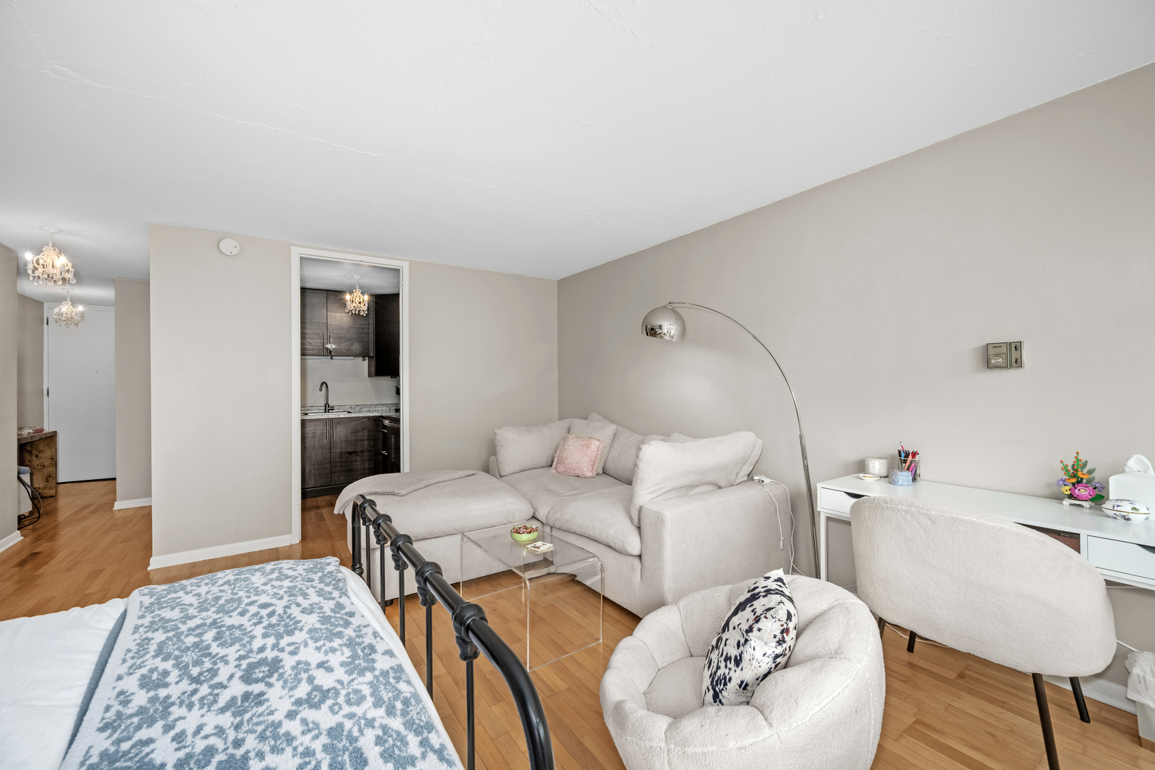 21 West Goethe Street, Unit 16E Chicago, IL 60610 - Photo 8 of 14 a living room with furniture and a rug