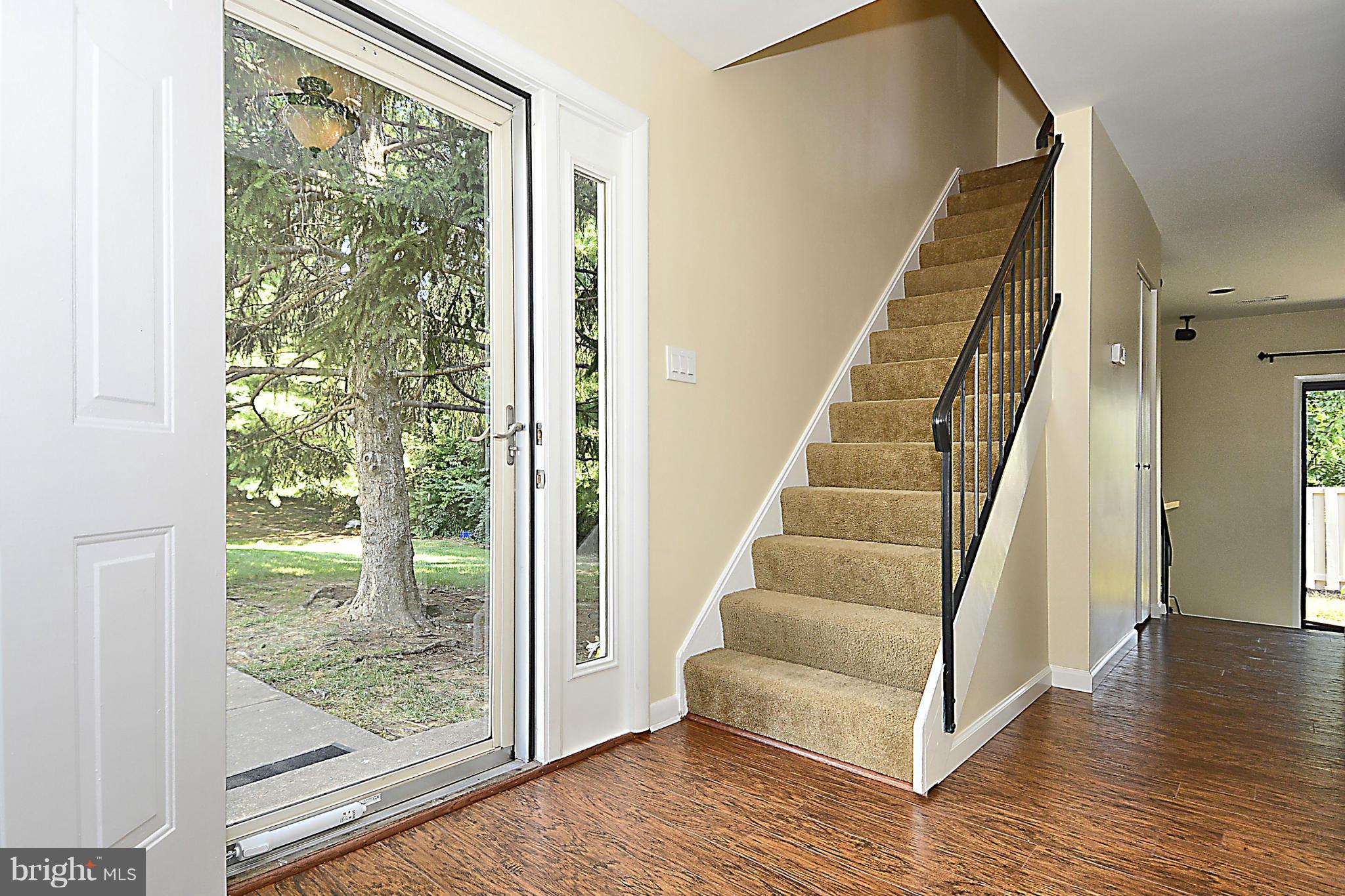 371 Reneau Way Herndon, VA 20170 - Photo 2 of 30 a view of entryway with wooden floor and stairs