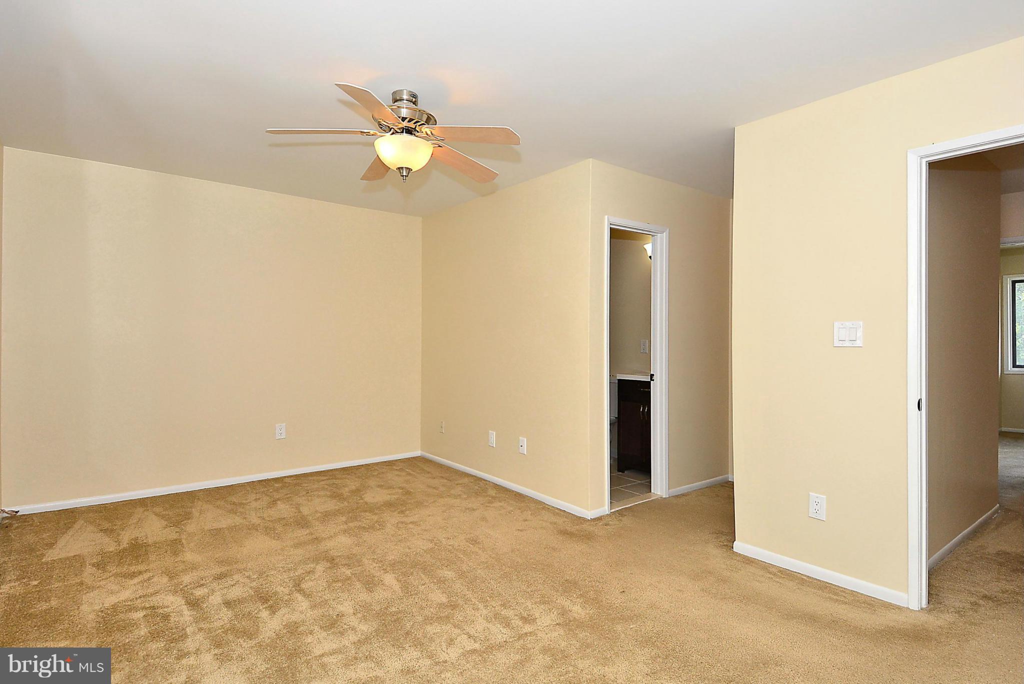 371 Reneau Way Herndon, VA 20170 - Photo 15 of 30 a view of a chandelier fan and a refrigerator
