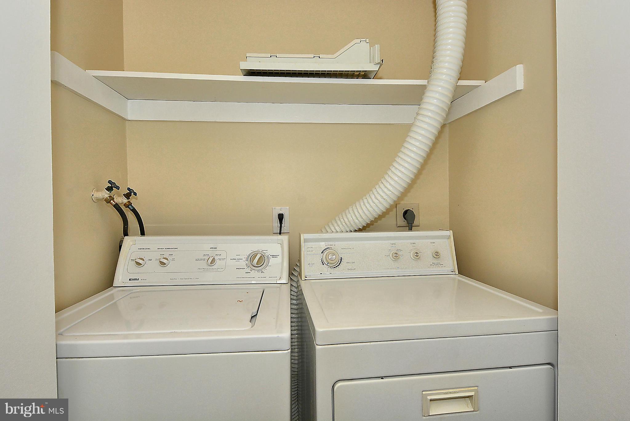 371 Reneau Way Herndon, VA 20170 - Photo 24 of 30 a utility room with dryer and washer
