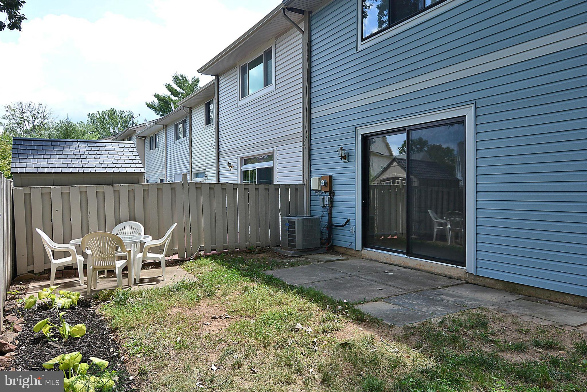 371 Reneau Way Herndon, VA 20170 - Photo 26 of 30 a view of a chair and table in backyard of the house