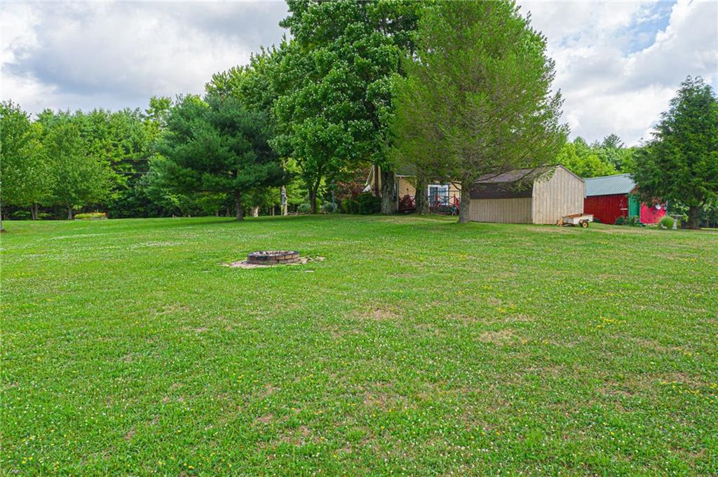 372 Halston Road Slippery Rock, PA 16057 - Photo 3 of 25 Fire Pit in the side yard for entertaining.