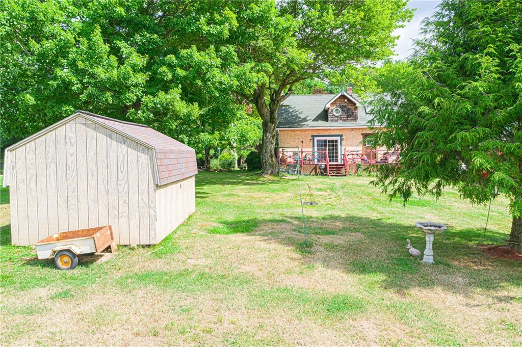372 Halston Road Slippery Rock, PA 16057 - Photo 22 of 25 Back view of the Home and Shed