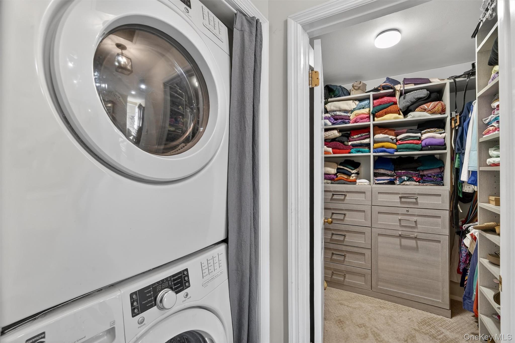 341 Furnace Dock Road, Unit 11 Cortlandt Manor, NY 10567 - Photo 23 of 38 Laundry and view of Walk-in Closet with built-in cabinets.