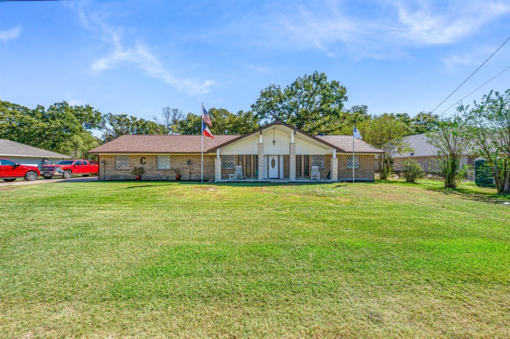1075 Oak Ridge Drive Terrell, TX 75160 - Photo 1 of 28 a front view of house with an outdoor space